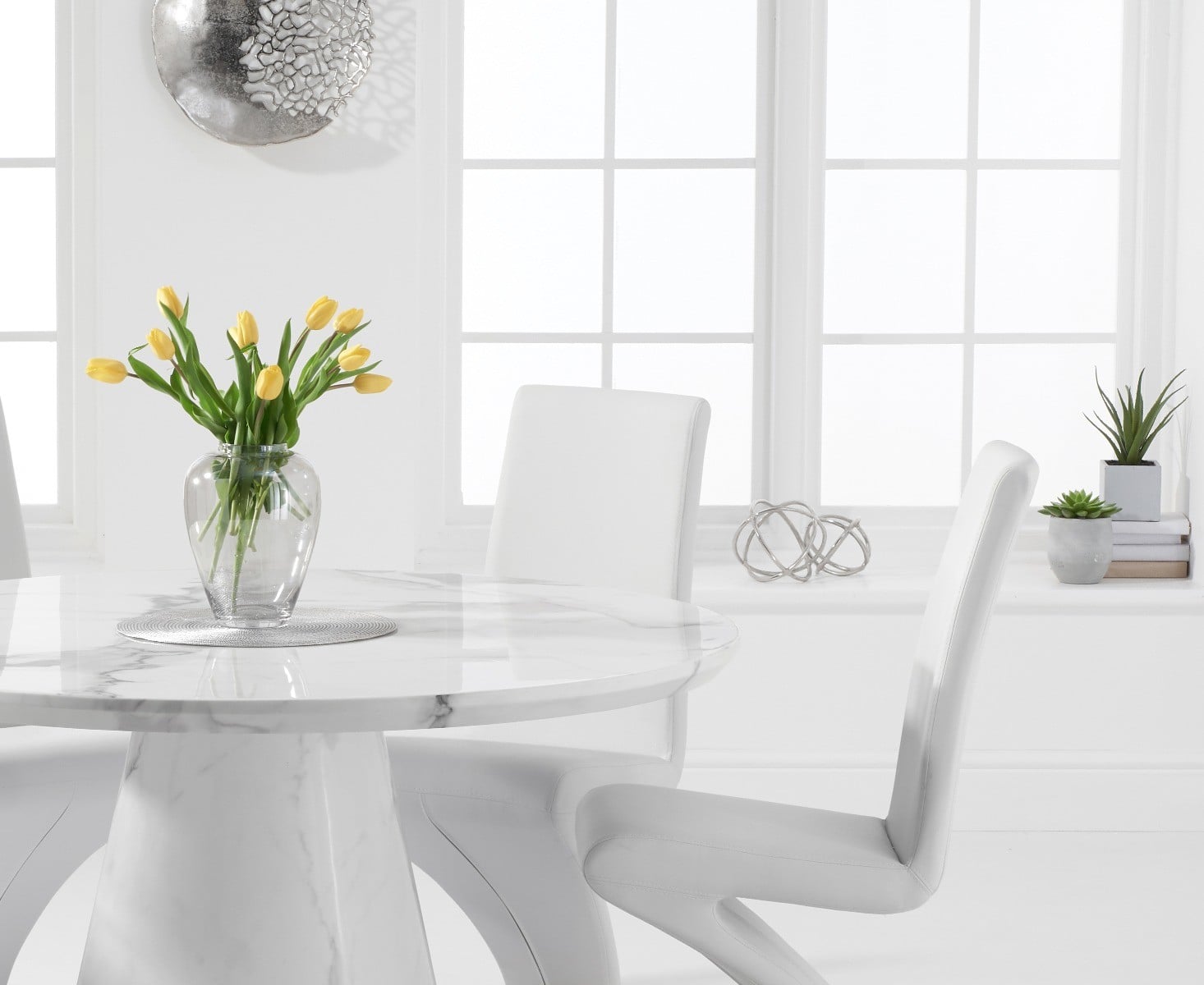 Ravello 130cm Round White Marble Dining Table with 4 Black Aldo Chairs