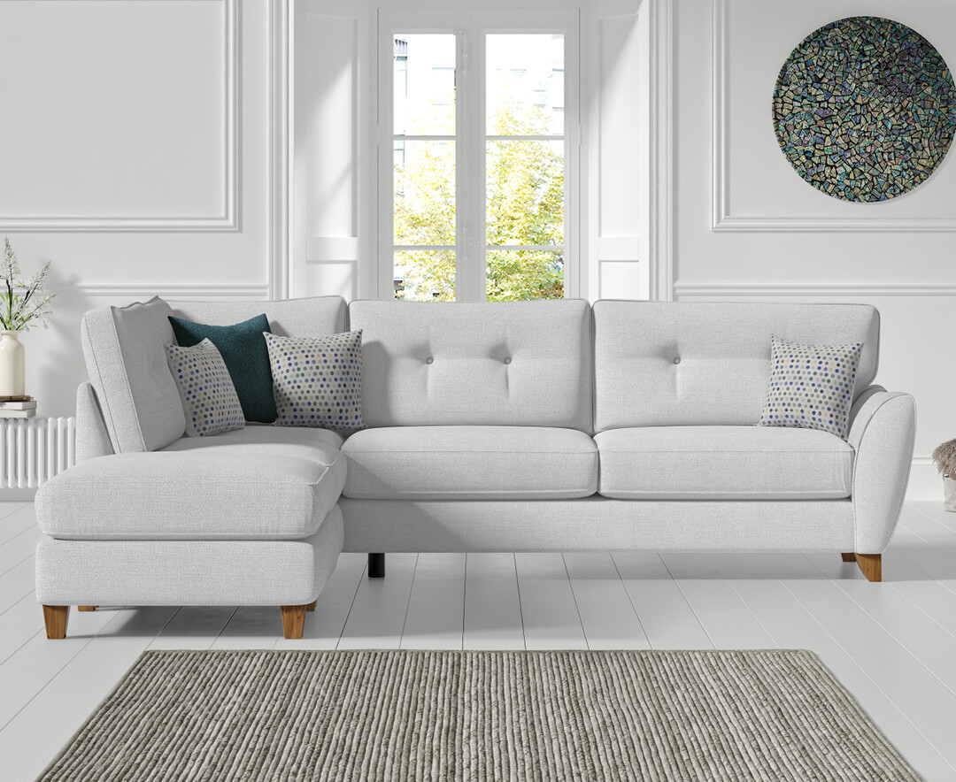 Click to view product details and reviews for Florin Light Grey Fabric Left Hand Facing Corner Chaise Sofa. Click to view product details and reviews for Florin Light Grey Fabric Left Hand Facing Corner Chaise Sofa.