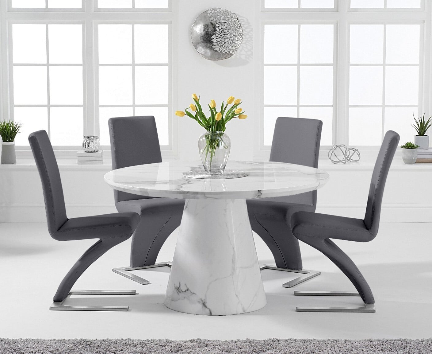 Ravello 130cm Round White Marble Dining Table with 4 Black Aldo Chairs